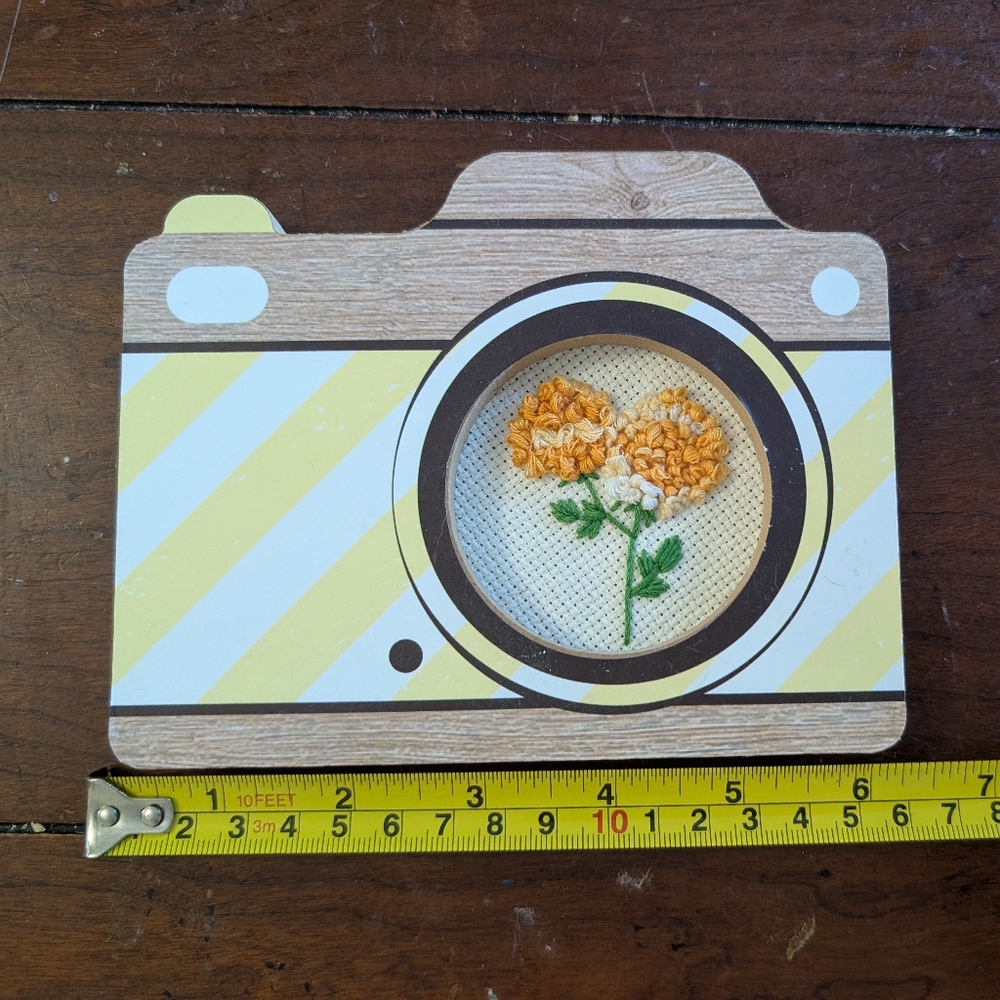Yellow and White Embroidered Floral Art